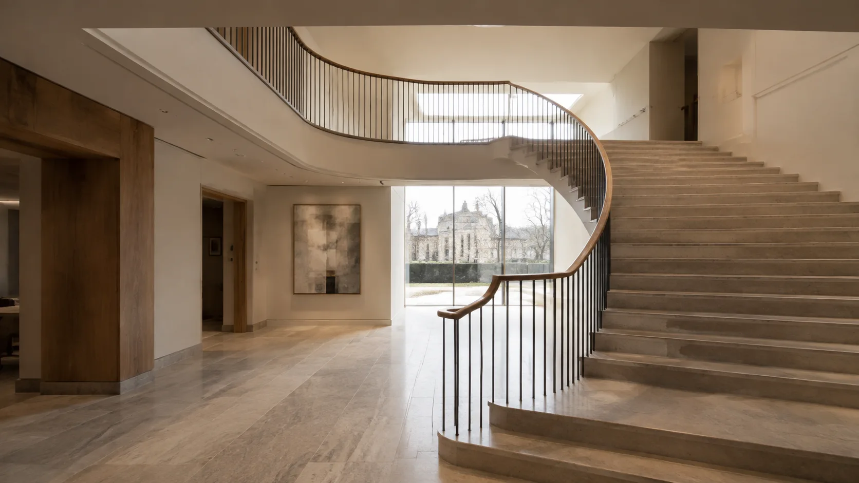 Double-height cultural building with an architectural staircase